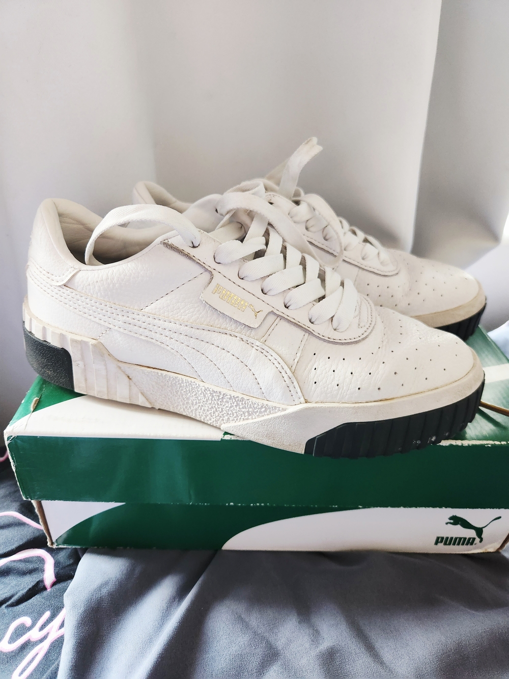 PUMA White Leather Sneakers with Black Sole